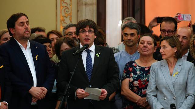 Catalan President Carles Puigdemont speaks during a ceremony after the Catalan regional Parliament declared independence from Spain in Barcelona