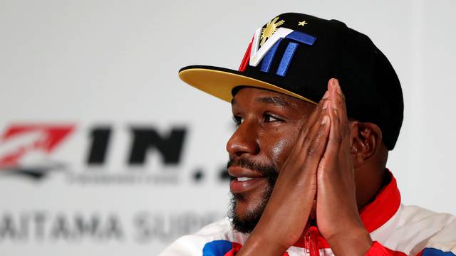 Boxer Floyd Mayweather Jr. of the U.S. attends a news conference in Tokyo