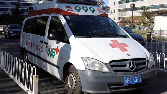 Ambulance leaves a children's hospital in Beijing
