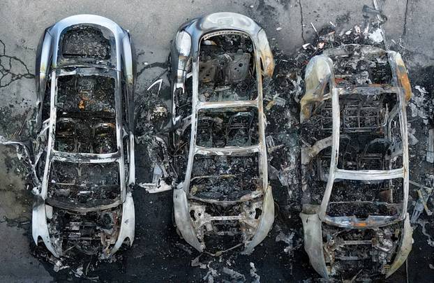 Fire at a Tesla dealership that destroyed seventeen vehicles