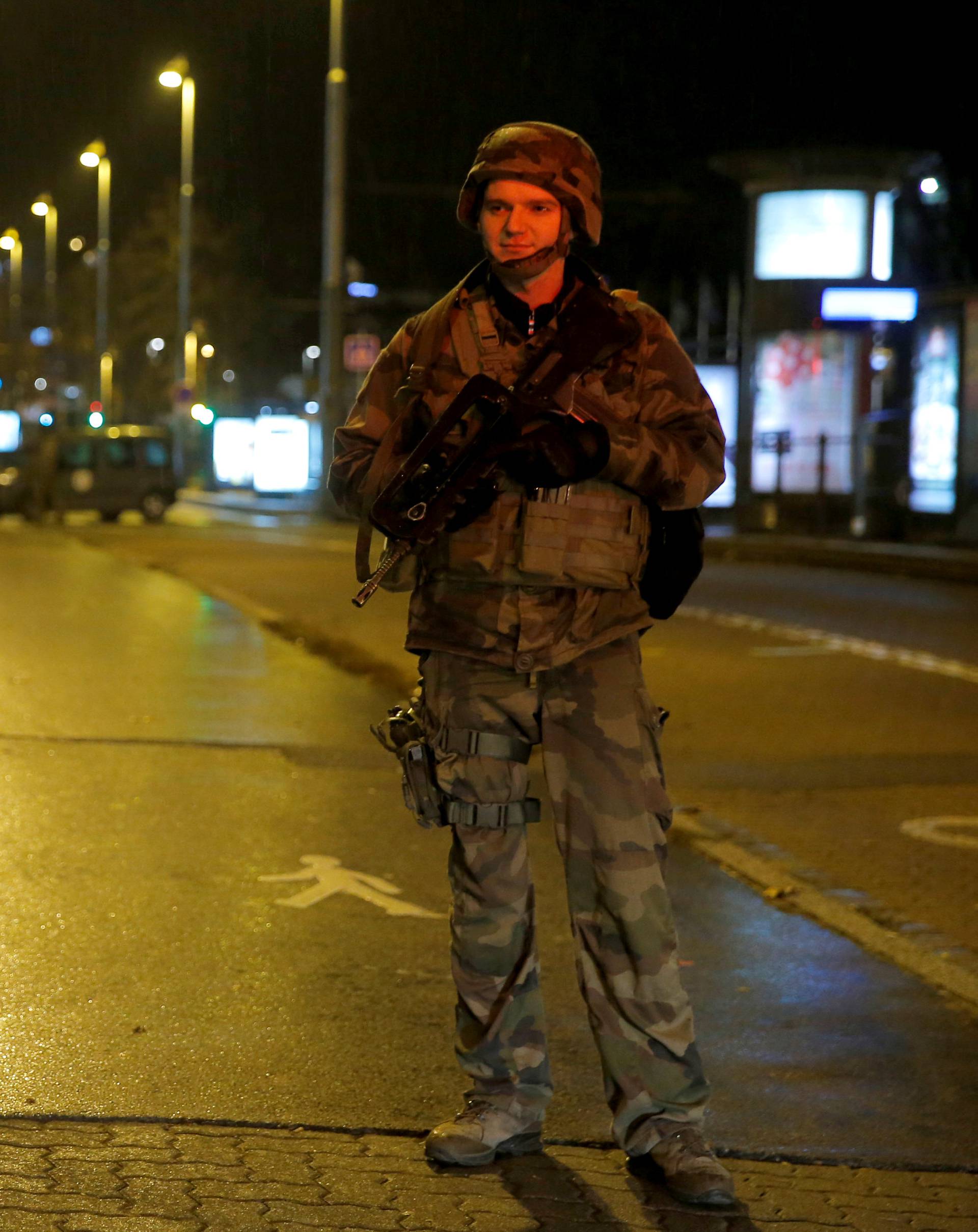 Soldiers secure area where a suspect is sought after a shooting in Strasbourg