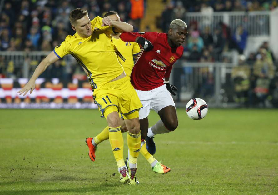 Manchester United's Paul Pogba in action with FC Rostov's Aleksandr Bukharov