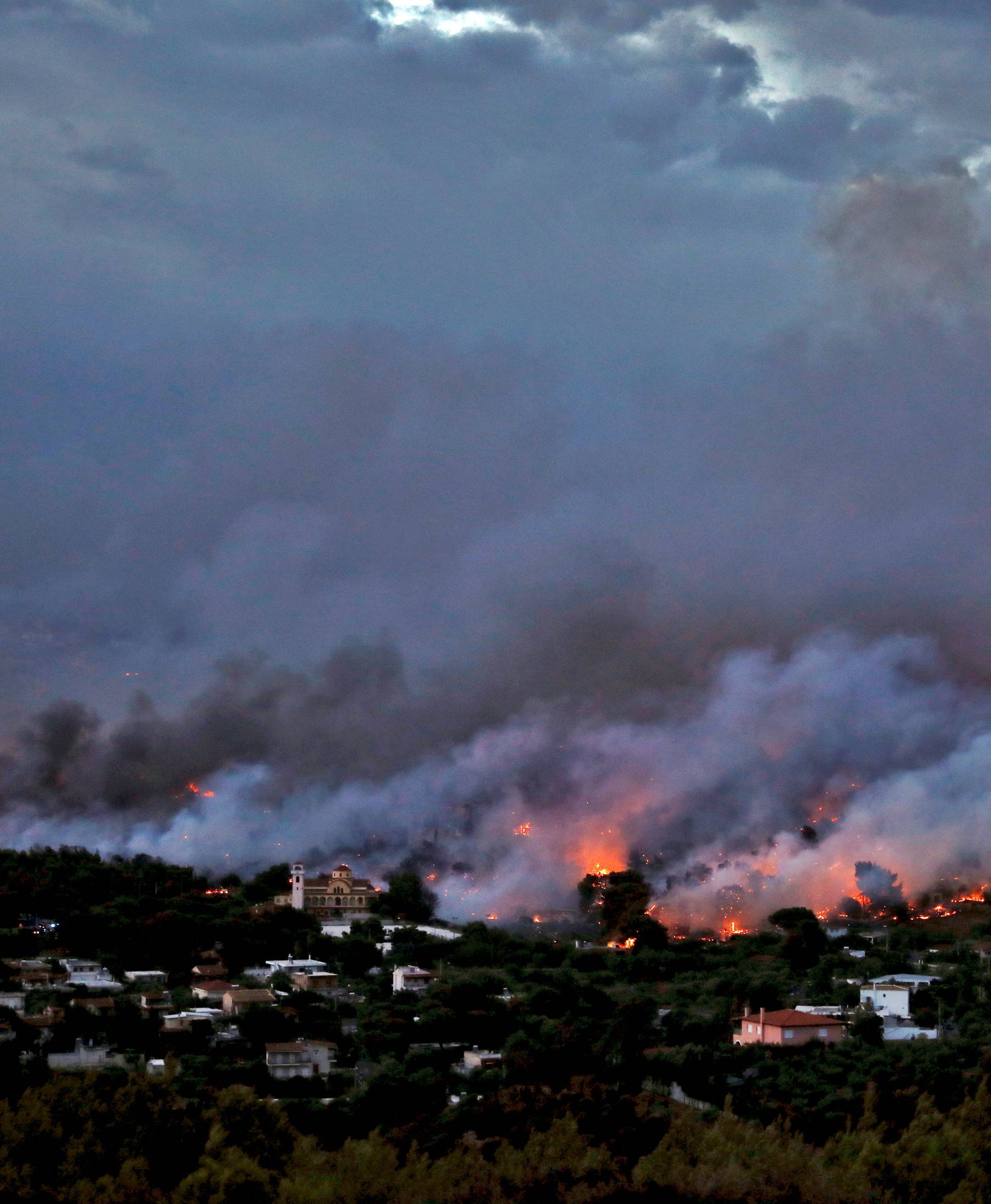 Wildfire burns in Rafina, near Athens