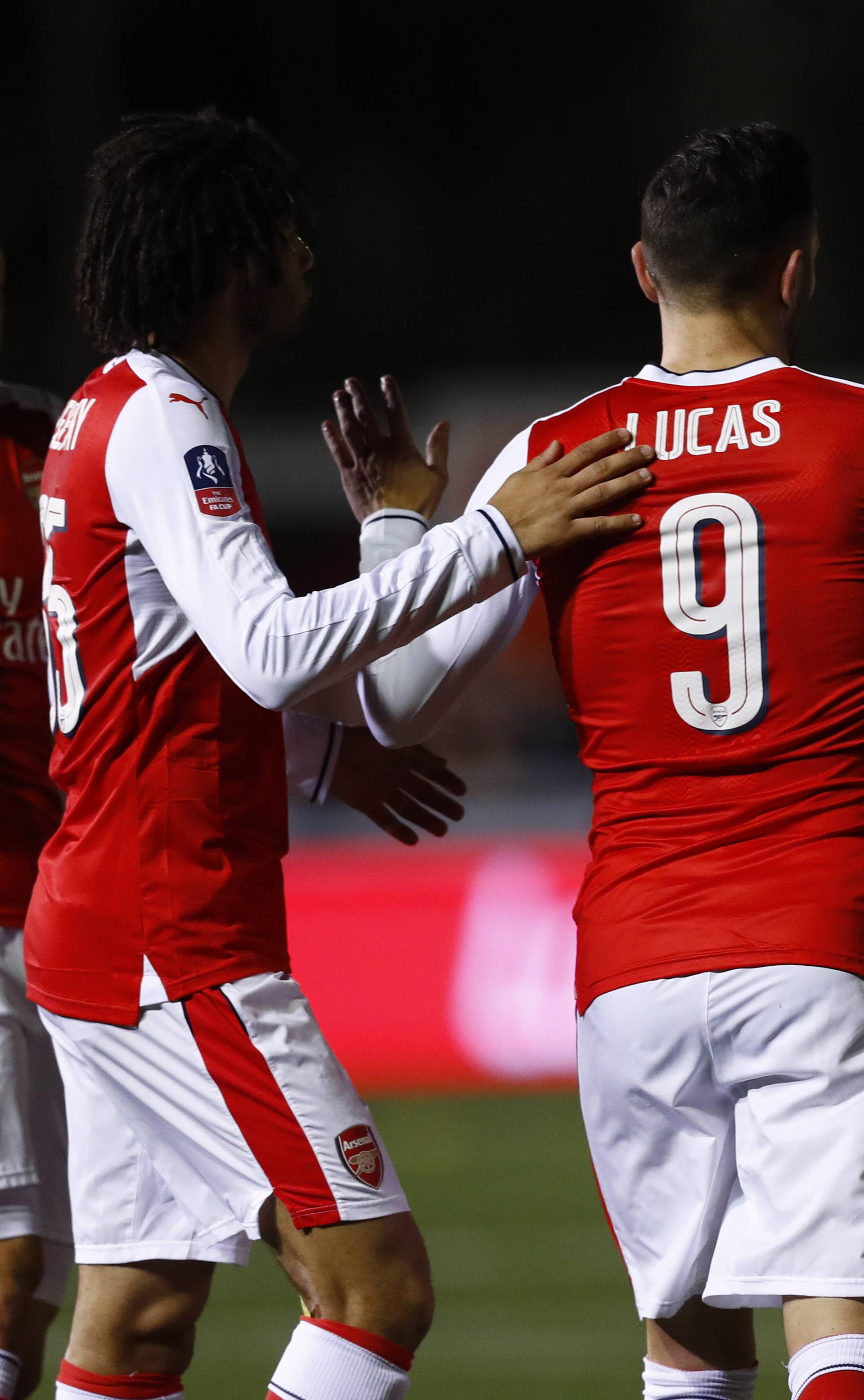 Arsenal's Lucas Perez celebrates scoring their first goal with Granit Xhaka, Mohamed Elneny and Gabriel Paulista