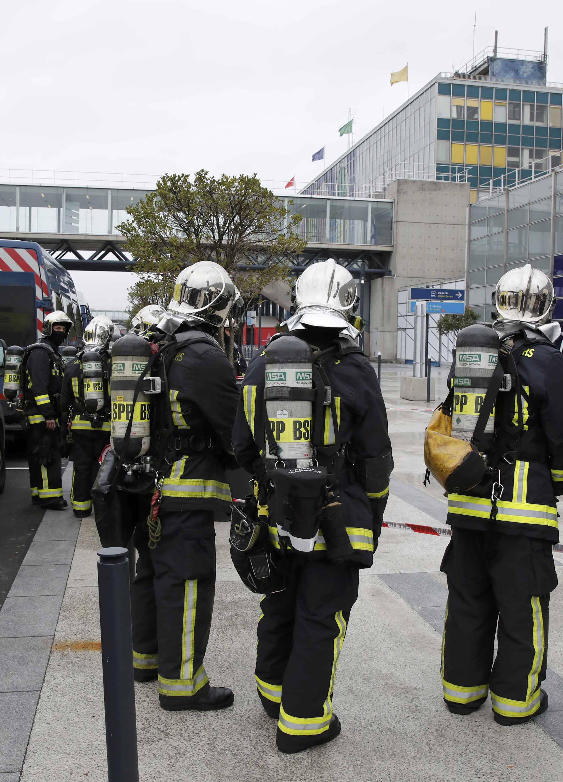 Emergency services  at Orly airport southern terminal after shooting incident near Paris