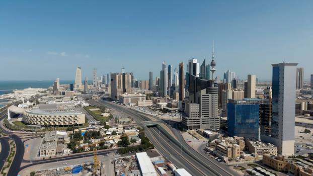 FILE PHOTO: A drone view shows Kuwait City in the aftermath of strikes by Israel and the U.S. on Iran