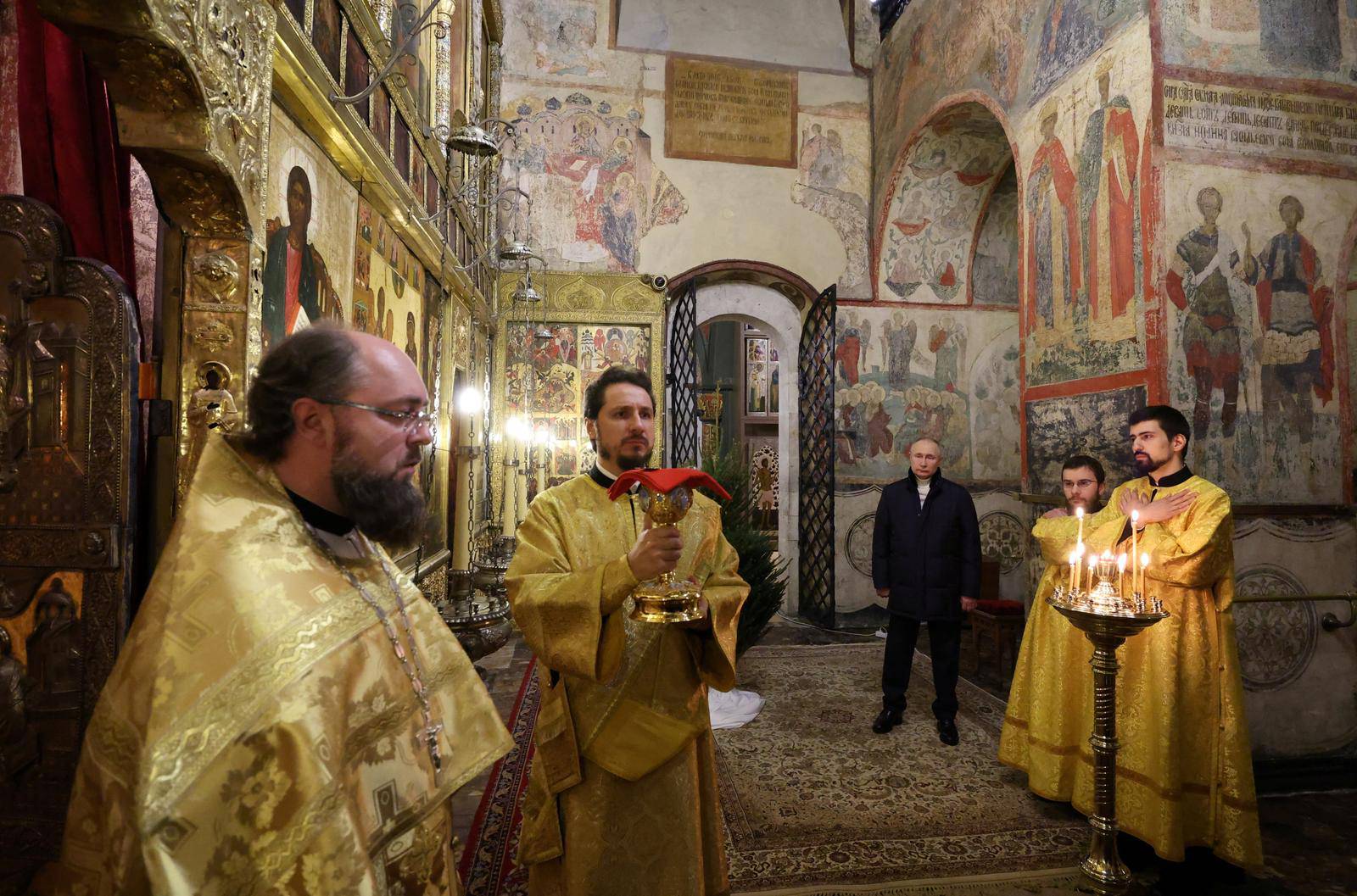 Russian President Vladimir Putin attends the Orthodox Christmas service in Moscow