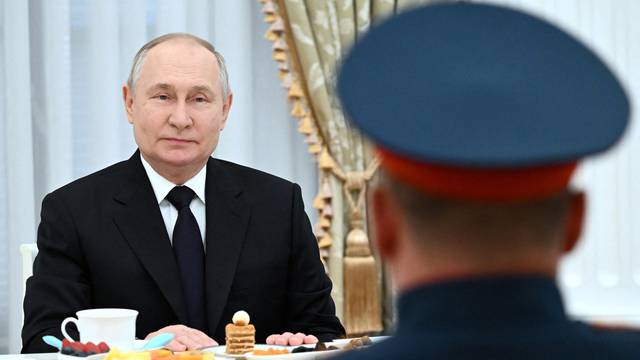 Russian President Putin meets with servicemen involved in Russia-Ukraine conflict, in Moscow
