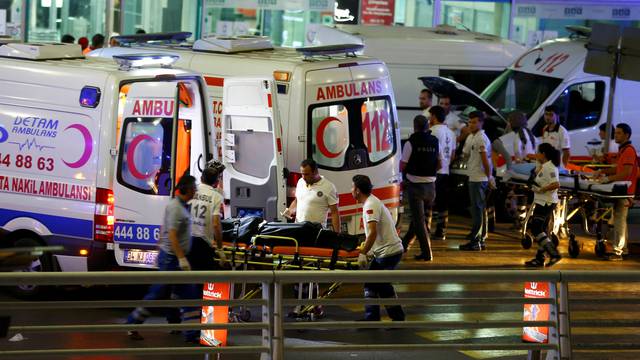 Paramedics push a stretcher at Turkey's largest airport, Istanbul Ataturk