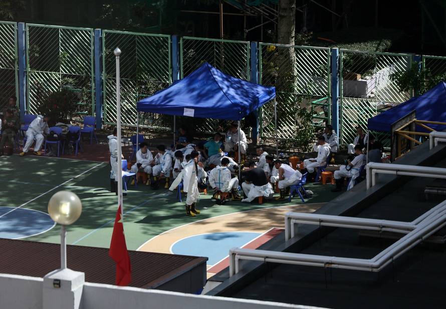 Aftermath of a deadly fire at the Wang Fuk Court housing complex in Hong Kong