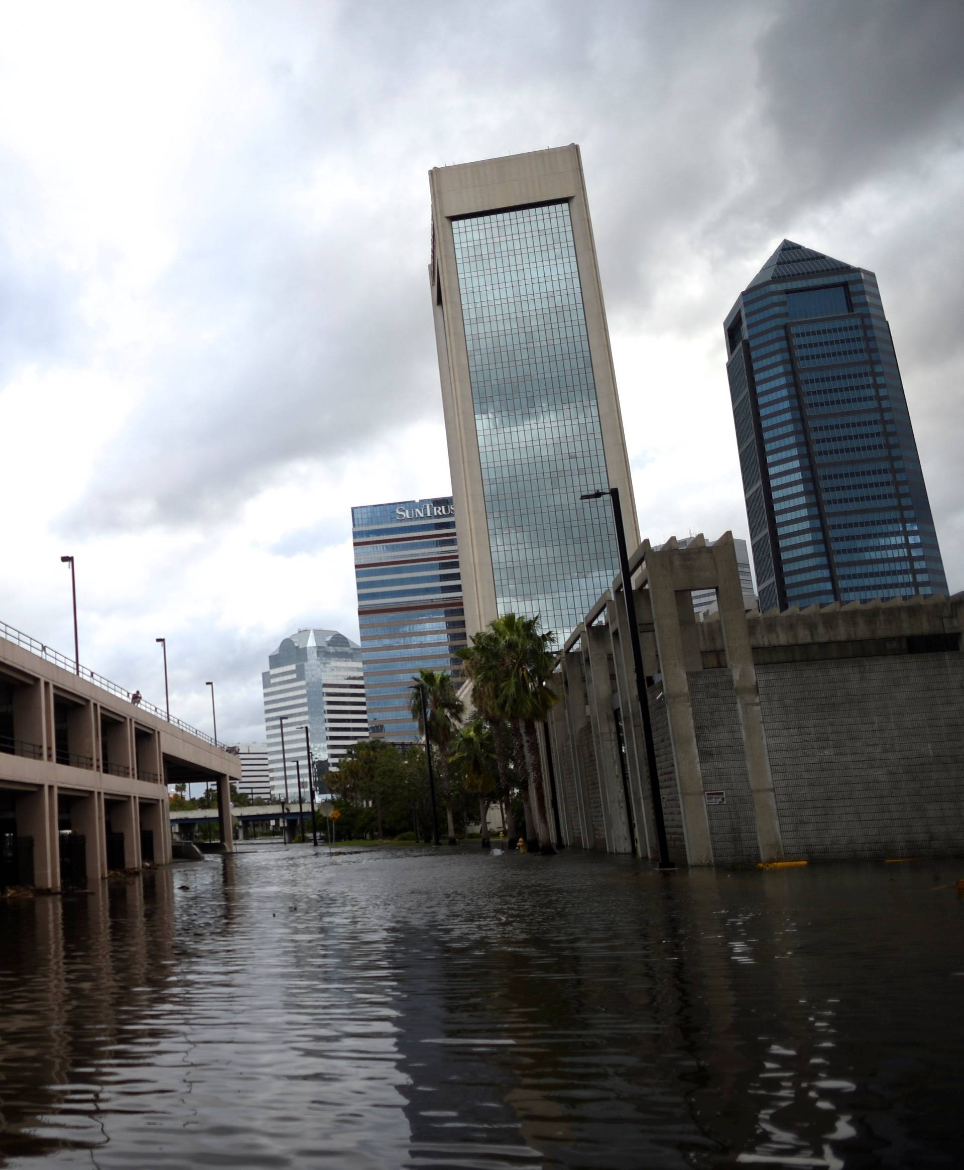 A couple overlooks floodwaters after Hurricane Irma