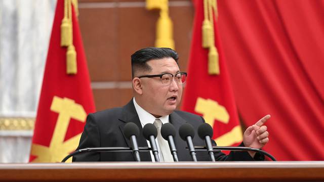 North Korean leader Kim Jong Un attends a session of the sixth enlarged meeting of the eighth Central Committee of the Workers' Party, in Pyongyang