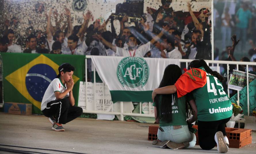 Fans of Chapecoense soccer team pay tribute to Chapecoense's players at the Arena Conda stadium in Chapeco