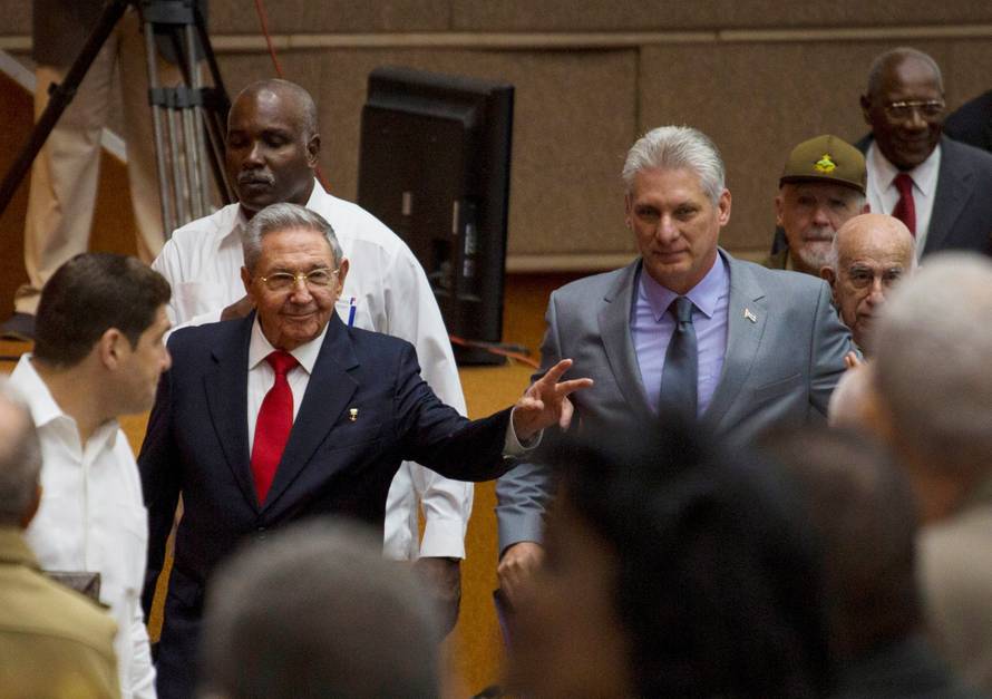 Cuba's President Raul Castro and First Vice-President Miguel Diaz-Canel arrive for a session of the National Assembly in Havana