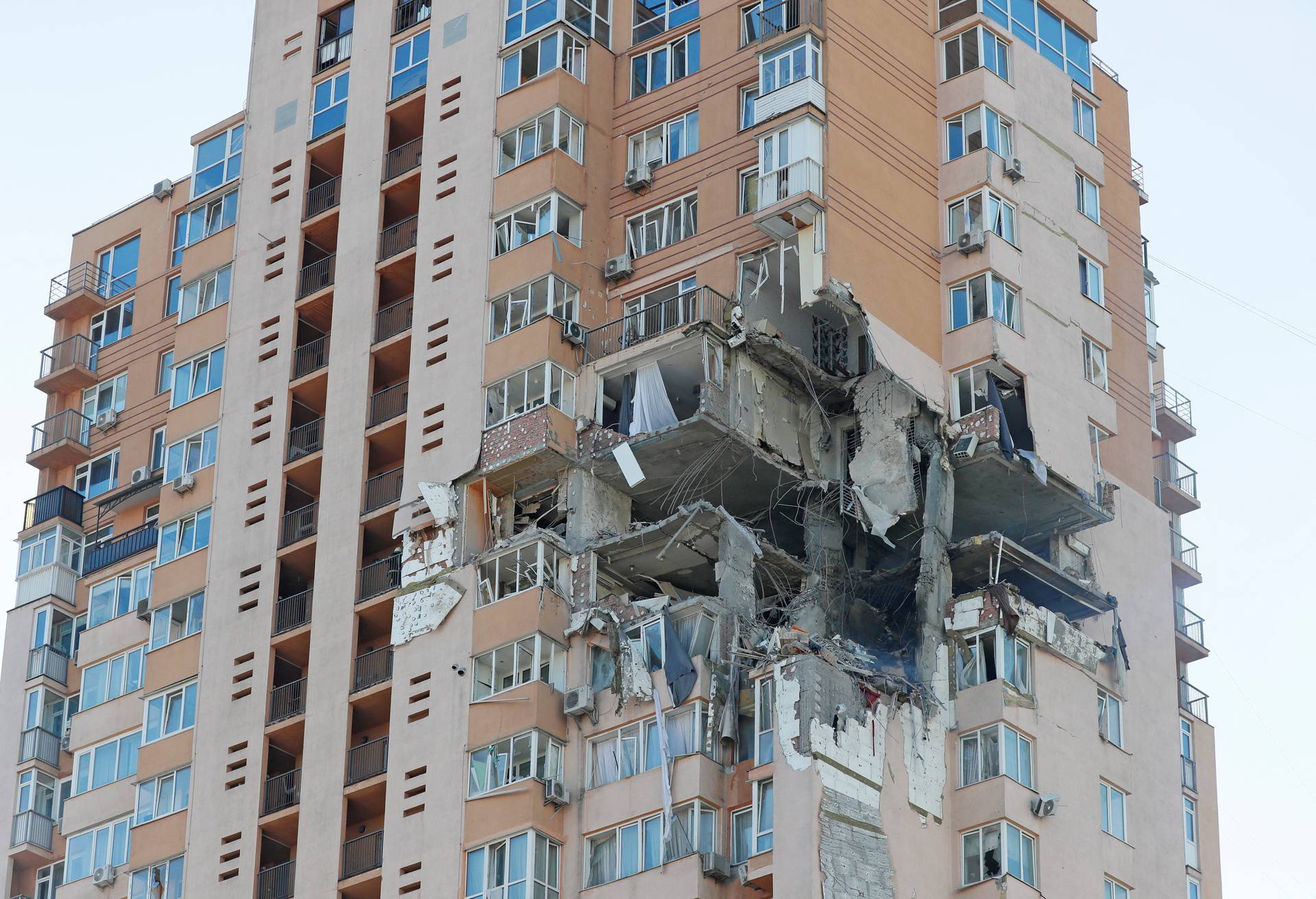 A view shows an apartment building damaged by recent shelling in Kyiv