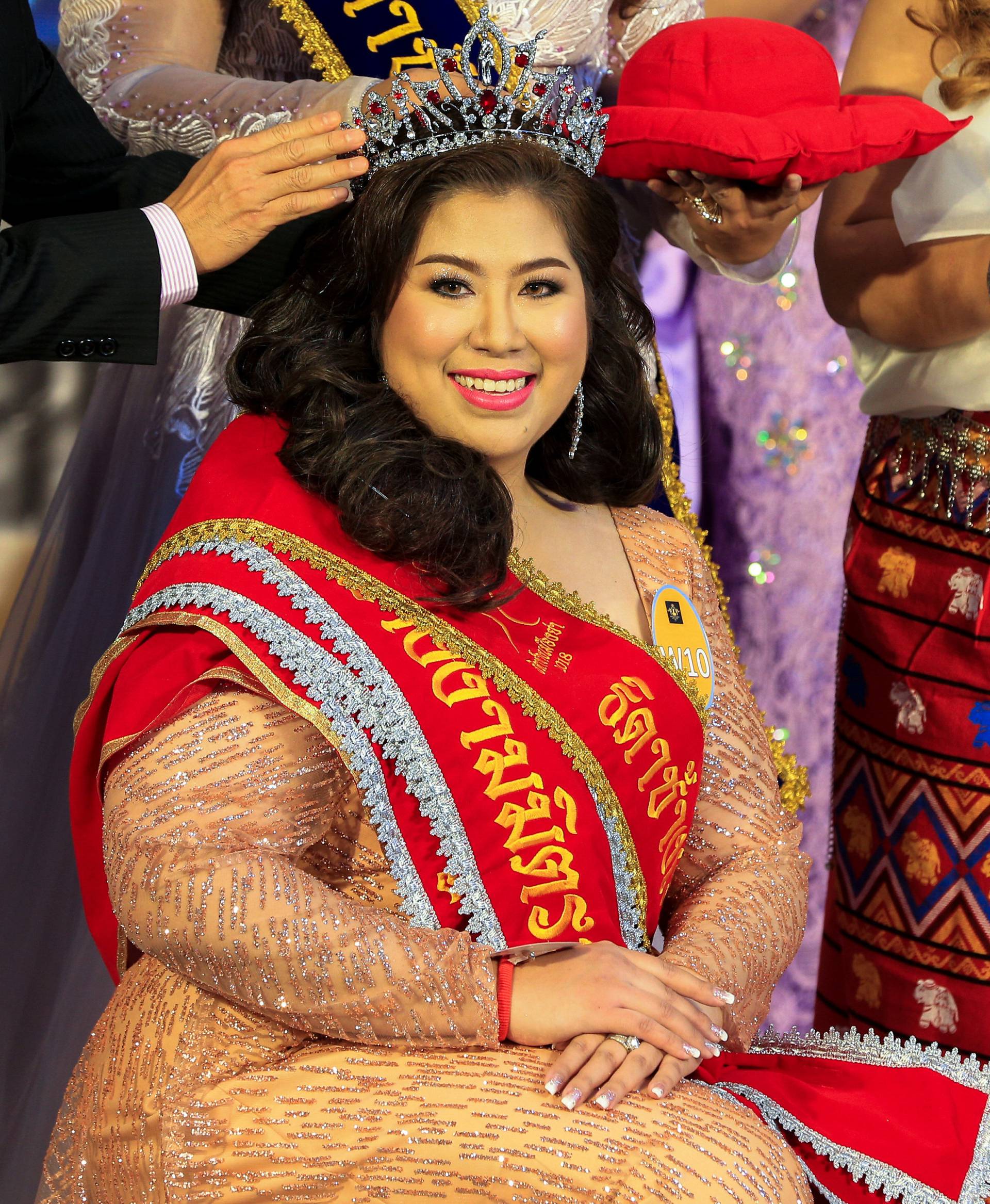 Contestant Kwanrapee Boonchaisuk reacts as she is crowned winner of the Miss Jumbo 2018 at a department store in Nakhon Ratchasima