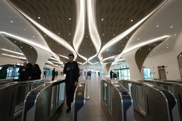 Passengers arrive at the King Abdullah Financial District Metro Station in Riyadh
