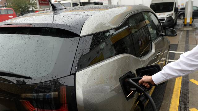 An electric car charges at the Holloway Road Shell station where Shell is launching its first fast electric vehicle charging station in London