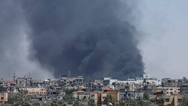 FILE PHOTO: Smoke rises during an Israeli air strike, in Rafah