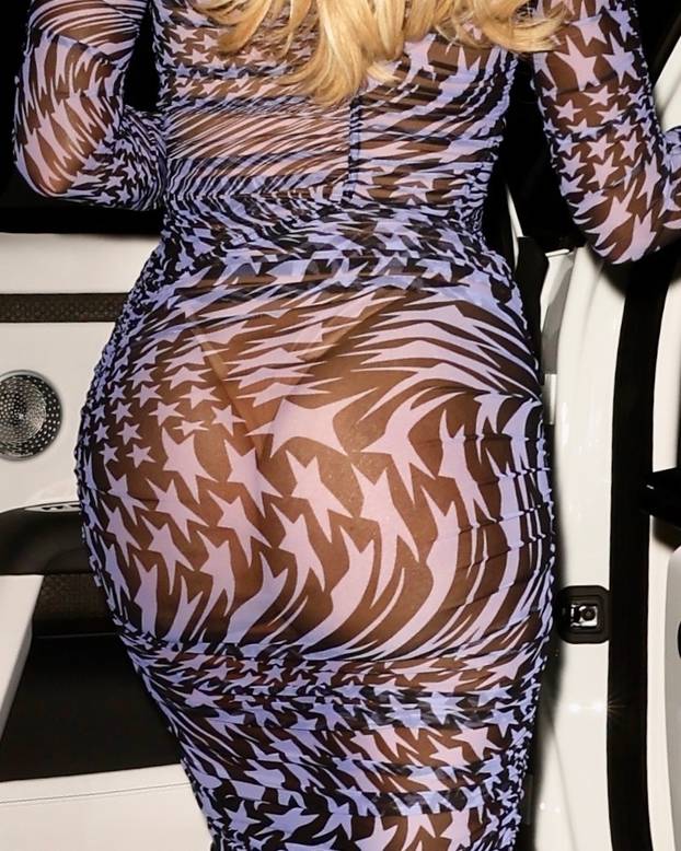 Cheeky! Khloe Kardashian shows off her incredible curves in a sheer dress in Weho