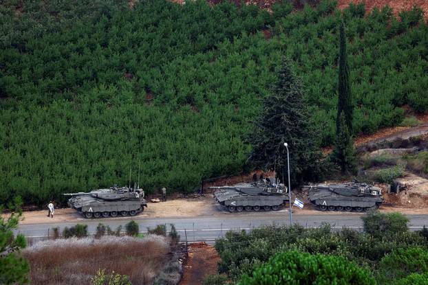 Israeli tanks are seen near Israel's border with Lebanon, as tension mounts between the two countries, in northern Israel