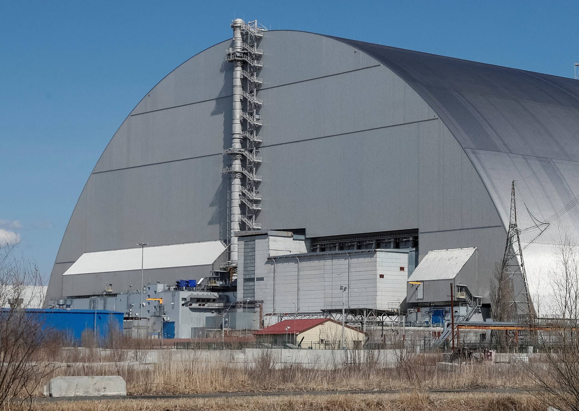 General view of the New Safe Confinement structure over the old sarcophagus covering the damaged fourth reactor at the Chernobyl Nuclear Power Plant, in Chernobyl