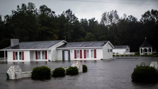 A house is seen flooded by rain after Hurricane Florence swept through the town of Wallace