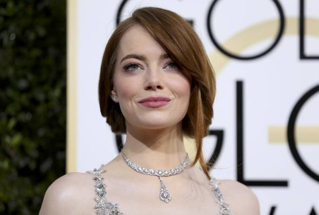 Actress Emma Stone arrives at the 74th Annual Golden Globe Awards in Beverly Hills