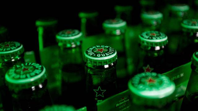 FILE PHOTO: Heineken beer bottles are seen at a bar in Monterrey