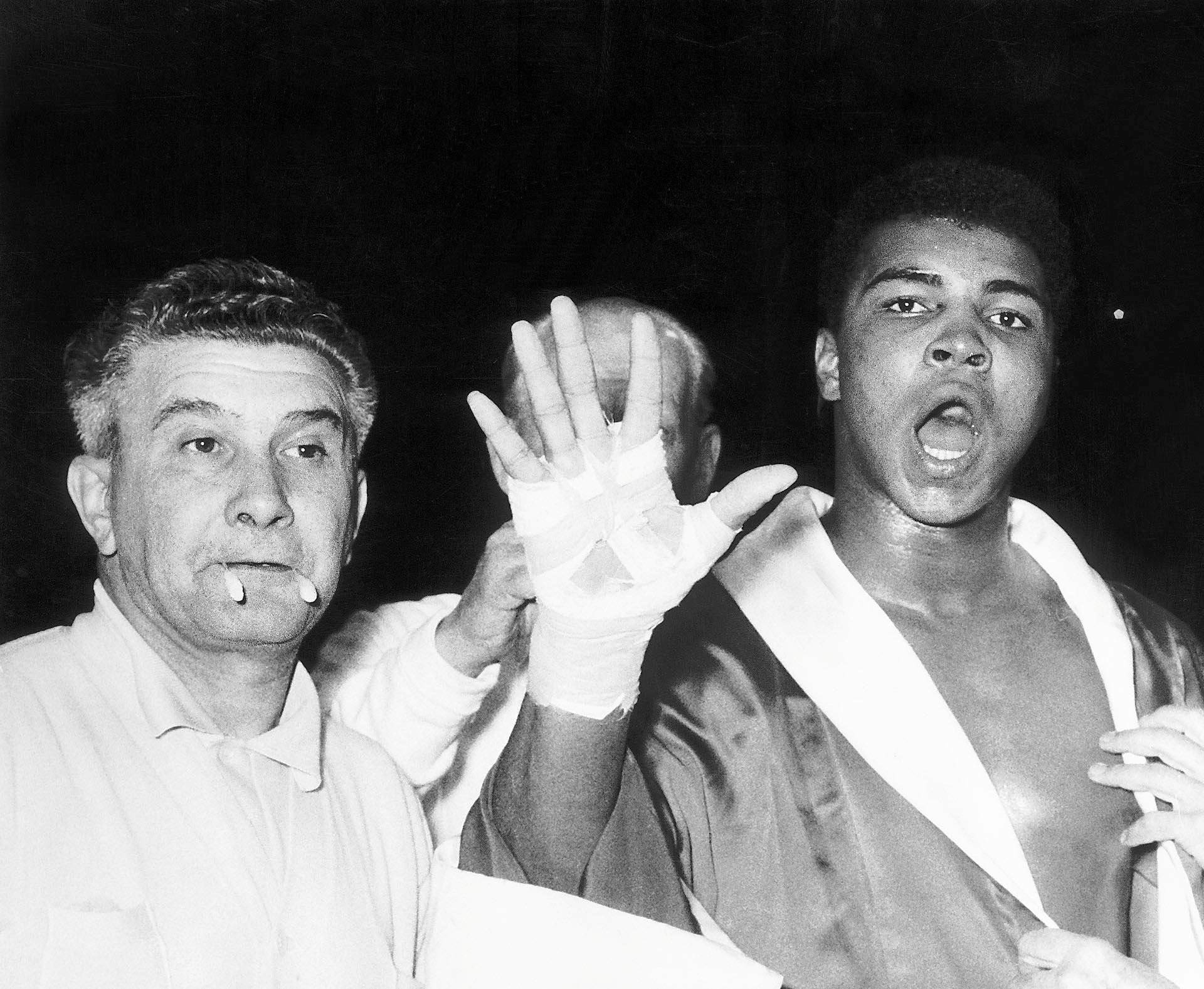  Cassius Clay (later Muhammad Ali) predicts that he will in the fifth round before his fight with Henry Cooper at Wembley Stadium in London