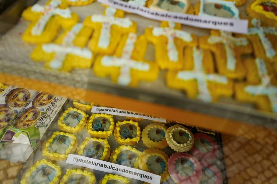 View of a bakery storefront with cookies with Pope Francis images ahead of his apostolic journey to Portugal, in Lisbon