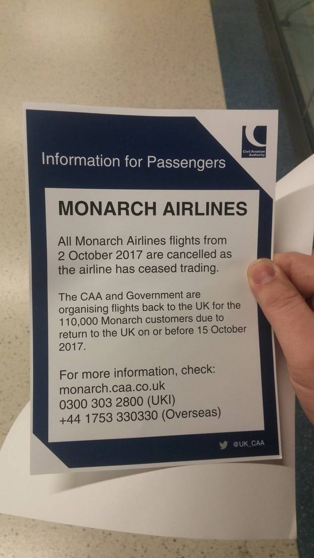 A note on the cessation of operation of Monarch Airlines flights is shown at Gatwick Airport, London