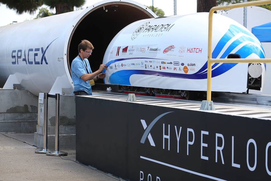 Paradigm Hyperloop team from Memorial University in Newfoundland, Canada prepare to run their hyperpod at SpaceX's Hyperloop Pod Competition II in Hawthorne