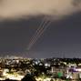 FILE PHOTO: An anti-missile system operates after Iran launched drones and missiles towards Israel, as seen from Ashkelon