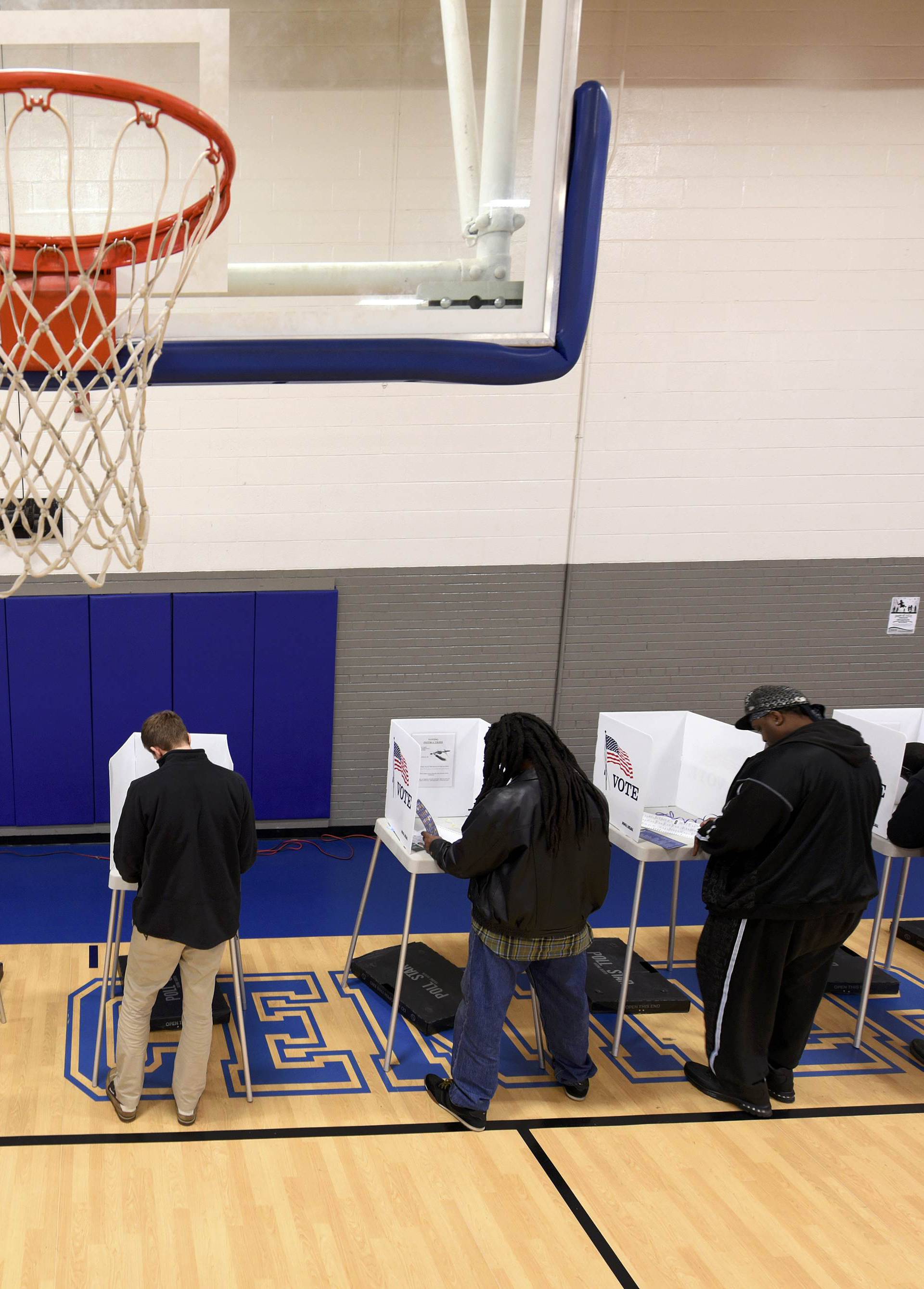 Citizens vote on a basketball court at a recreation center during the U.S. general election in Greenville, North Carolina