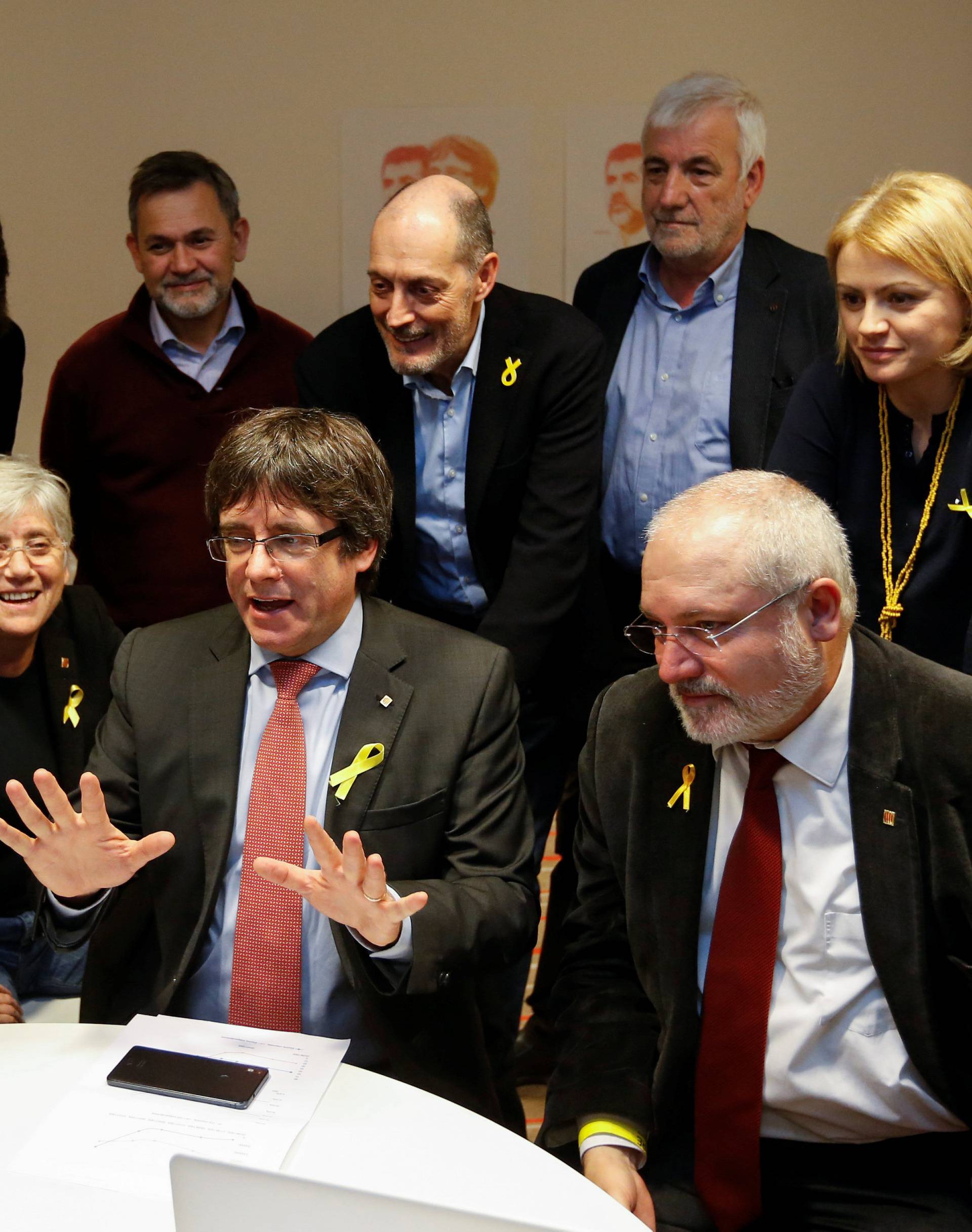 Carles Puigdemont, dismissed President of Catalonia, reacts while viewing results in Catalonia's regional election in Brussels