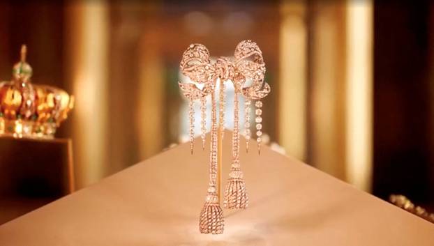 A jewel-encrusted brooch worn by French Empress Eugenie, which was among the items stolen by thieves during a heist at Paris' Louvre Museum on October 19, 2025, on display in this undated still frame from a video