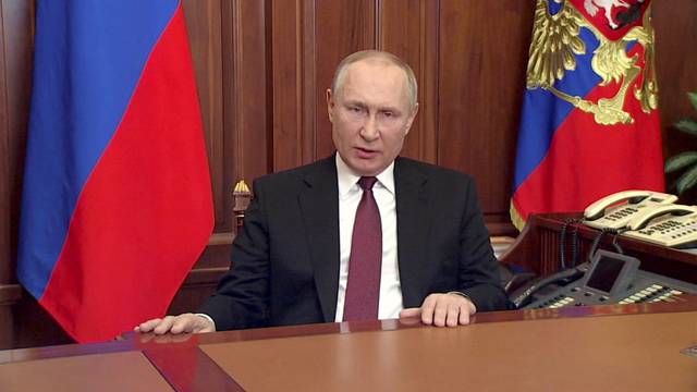 FILE PHOTO: Russian President Vladimir Putin delivers a video address in Moscow