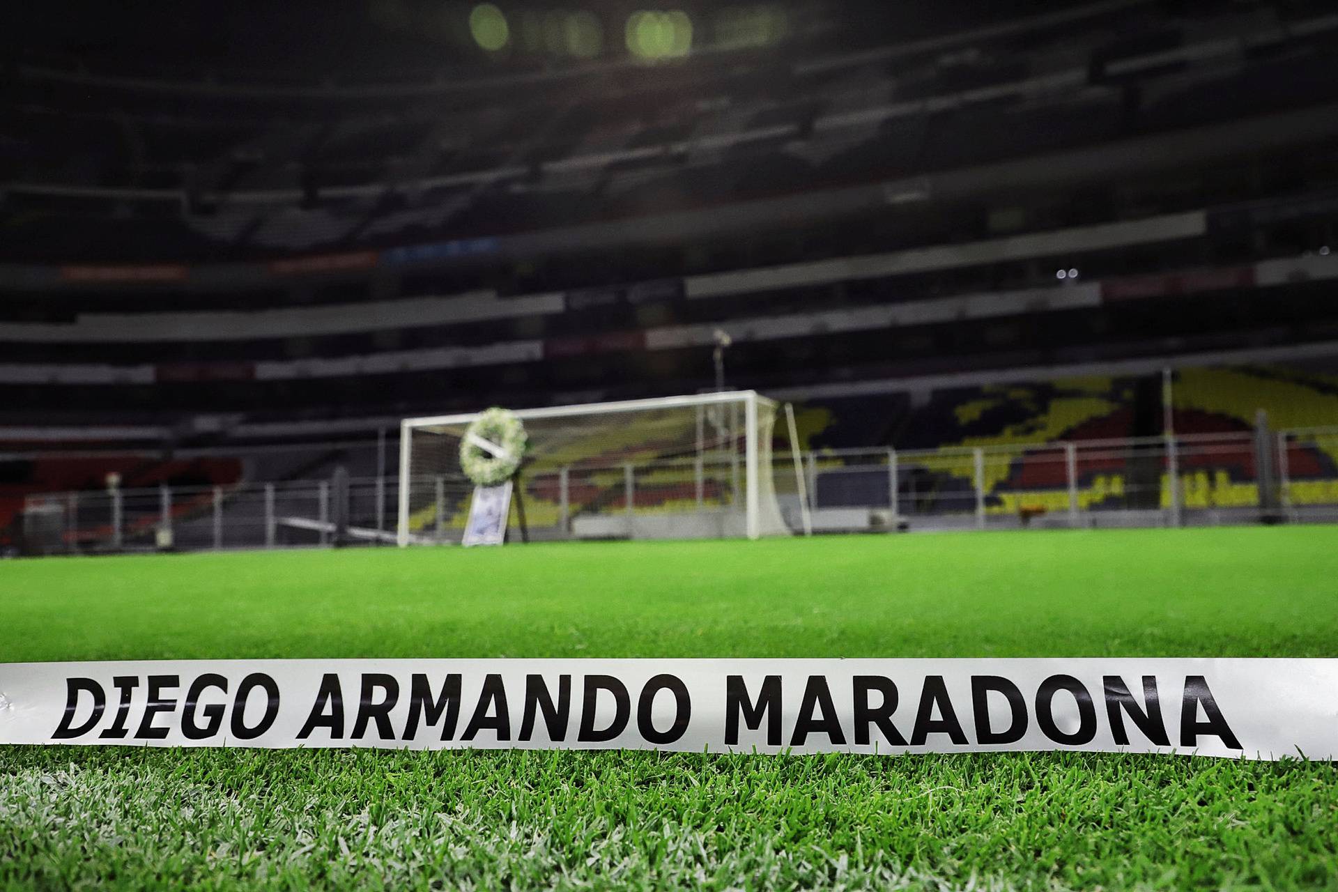 A picture of Maradona and a wreath are placed next to the goal where Maradona scored a goal in the 1986 World Cup, in Mexico City