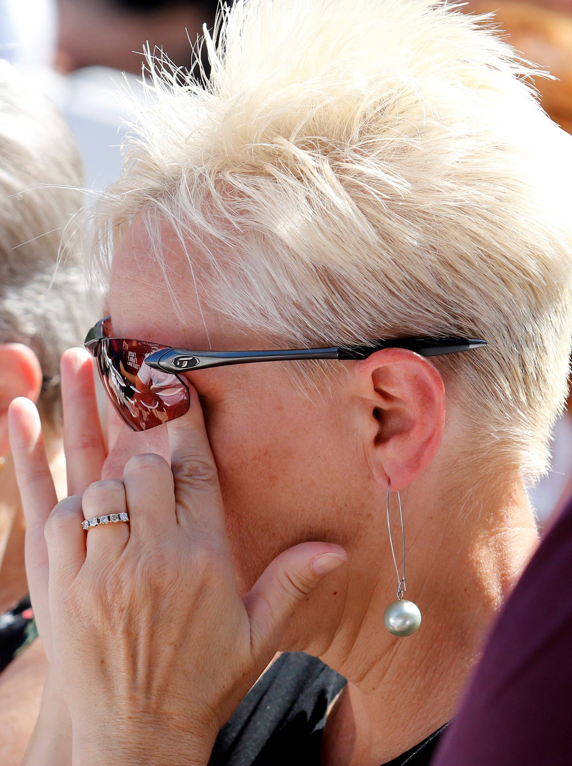 Mourners  attend a memorial for the Marjory Stoneman Douglas High School victims  following a school shooting incident in Parkland