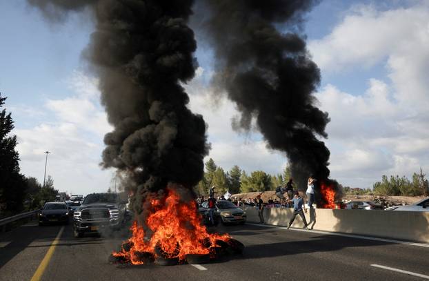 People block Israel's main highway connecting Jerusalem and Tel Aviv near Latrun