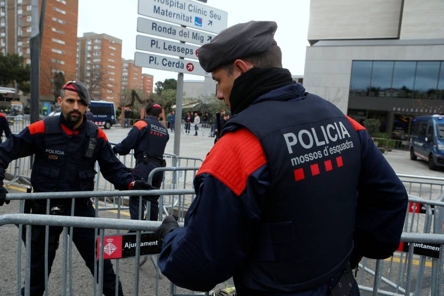 Police reinforce security before Real Madrid players arrive at their hotel in Barcelona