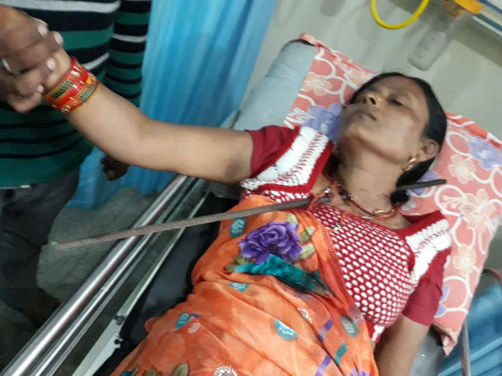 IRON ROD IMPALES WOMANS NECK