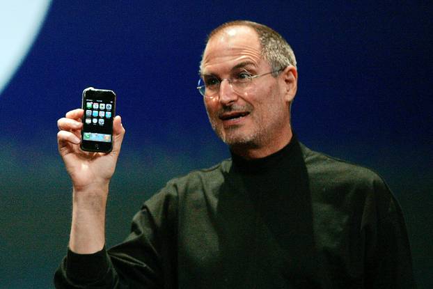 FILE PHOTO --  Apple Chief Executive Officer Steve Jobs holds new iPhone in San Francisco