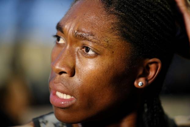 FILE PHOTO: South African athlete Caster Semenya speaks with journalists after she raced for the first time after her ban in France