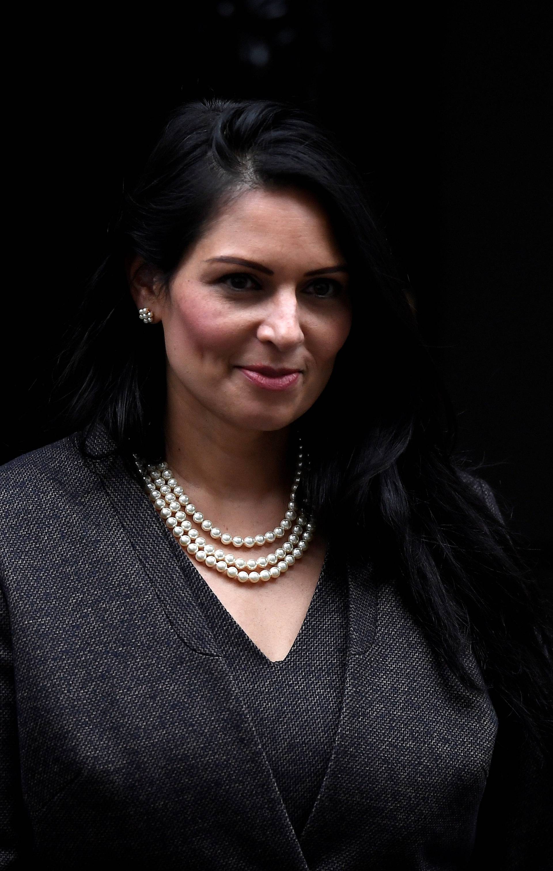 Britain's Home Secretary Priti Patel leaves Downing Street in London