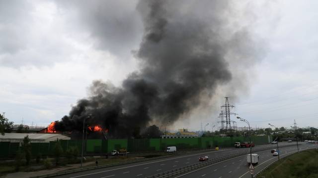 Flames and smoke rise from a fire at an electricity generating power station in Moscow region
