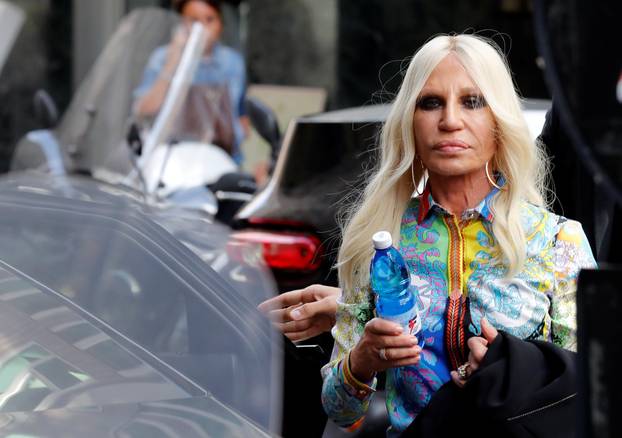 Italian designer Donatella Versace arrives to meet employees in Milan