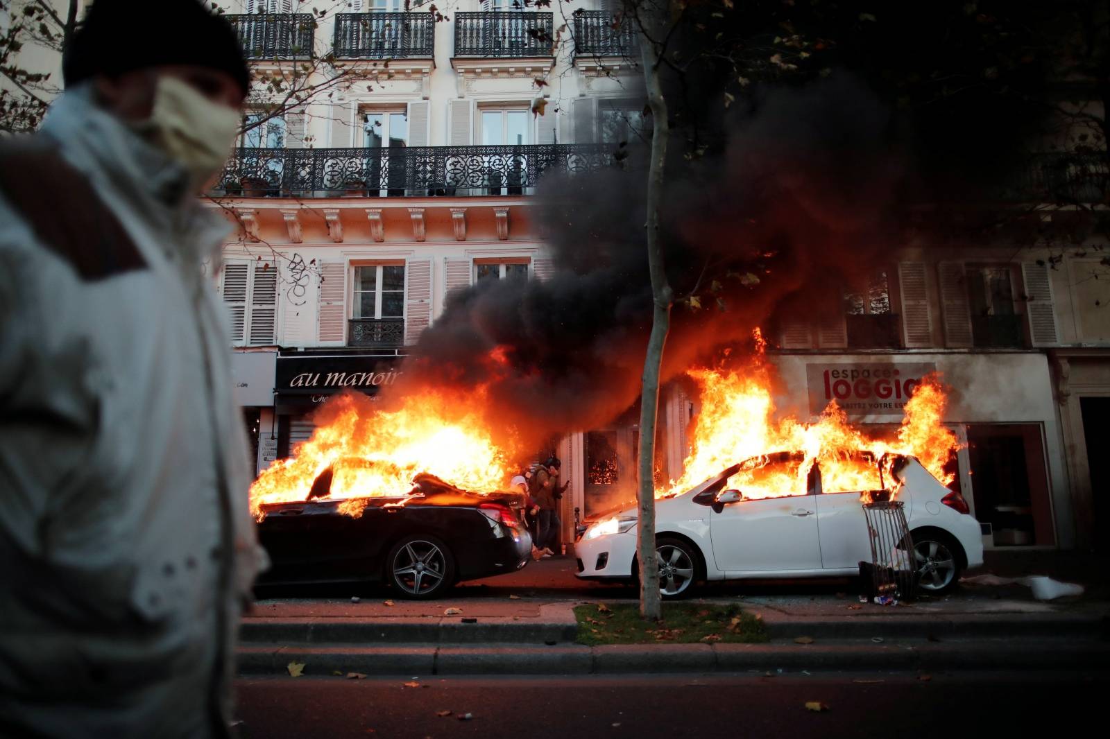 Protests over proposed curbs on identifying police, in Paris