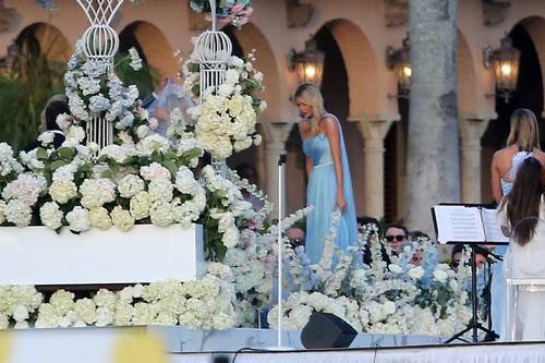 EXCLUSIVE: Donald Trump walks daughter Tiffany Trump down the aisle as Ivanka Trump follows behind and helps with her sisters dress as she marries Michael Boulos at Mar-A-Lago